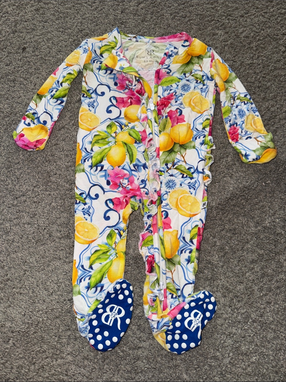 Bums and Roses ruffle onesie